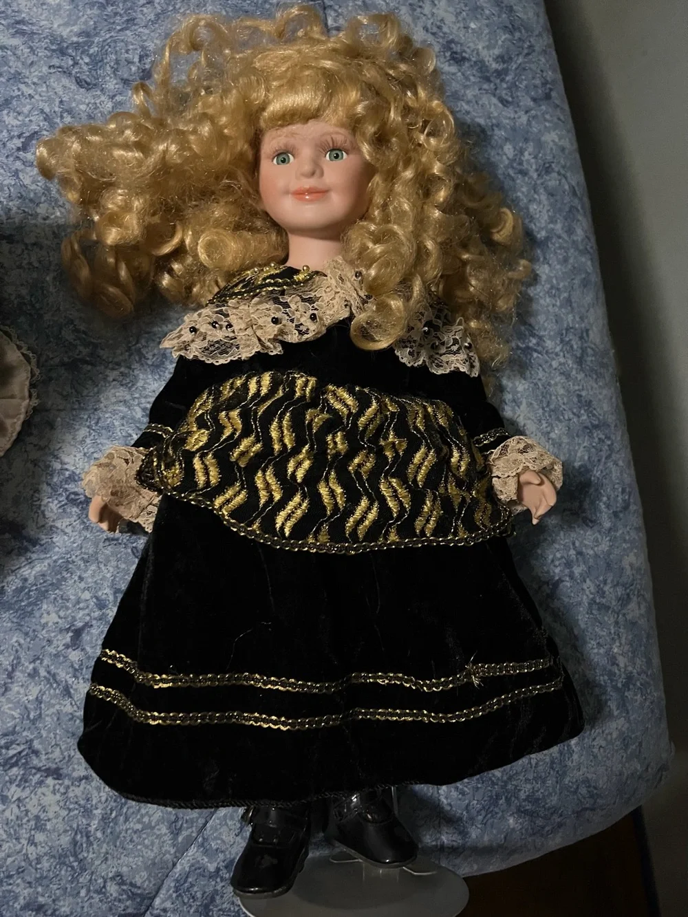 Porcelain Doll in Black and Gold Dress - Classic Collectible